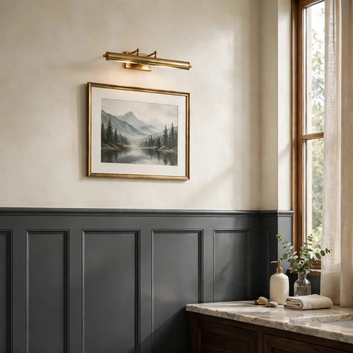 bathroom wall decor ideas: charcoal board-and-batten paneling with a brass picture light