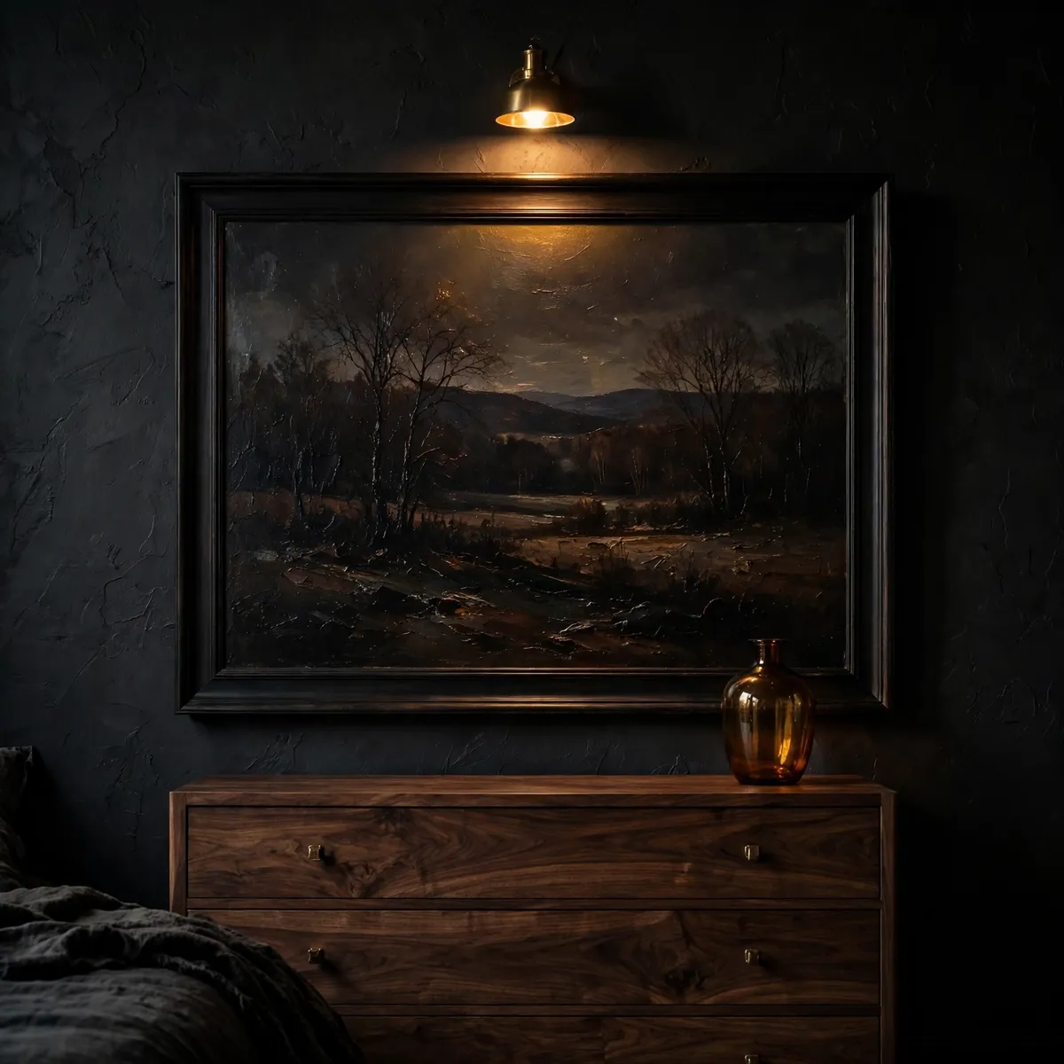moody bedroom decor ideas: oversized dark framed painting with brass picture light in moody bedroom